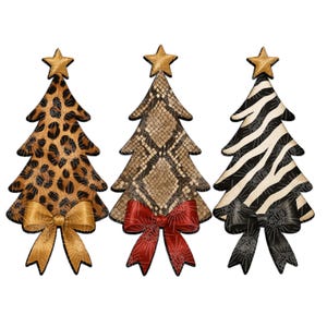 May include: Three decorative Christmas trees with animal print designs. The trees feature a leopard print, a snakeskin pattern, and a zebra print. Each tree is topped with a gold star and adorned with a bow at the base. The bows are gold, red, and black.