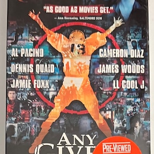 May include: DVD case for the movie "Any Given Sunday" featuring Al Pacino, Cameron Diaz, Dennis Quaid, Jamie Foxx, and LL Cool J. The case is red and black with a collage of images from the movie. The price is $6.99.