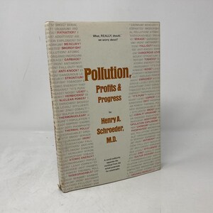 Puede incluir: Un libro titulado "Pollution, Profits & Progress" de Henry A. Schroeder, M.D. La portada es blanca con texto rojo y negro. El libro explora el impacto de la contaminación en la sociedad y el medio ambiente.