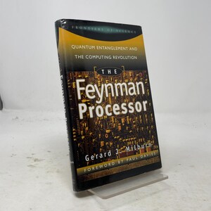 May include: A hardcover book titled The Feynman Processor: Quantum Entanglement and the Computing Revolution by Gerard J. Milburn, with a foreword by Paul Davies. The black cover features a gold circuit board graphic and yellow accents.