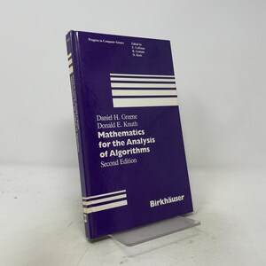 May include: A hardcover book titled Mathematics for the Analysis of Algorithms, Second Edition, by Daniel H. Greene and Donald E. Knuth. The cover is deep purple with white text and horizontal white lines. It is published by Birkhäuser.