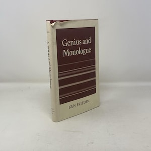 May include: A white book with a red and white striped cover. The title "Genius and Monologue" is printed in black on the cover. The author's name, "Ken Frieden", is printed in black at the bottom of the cover.