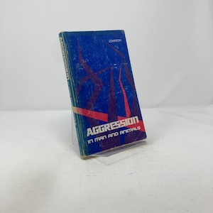 Aggression in man and animals by Roger N Johnson PB First Edition Paperback Very Good 1972 314763