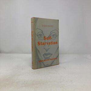 May include: A hardcover book titled "Self-Starvation" by Mara Selvini Palazzoli. The book's cover features a stylized illustration of a face in gray tones, with the title in orange. The spine also displays the title.