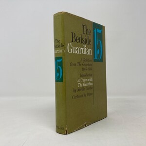 May include: A green book with the title "The Bedside Guardian" and the number "15" in blue. The book is a selection from The Guardian from 1965-1966 with an introduction by Neville Cardus and cartoons by Paps.