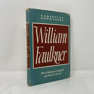 May include: A teal book titled "William Faulkner: A Critical Appraisal" with white text on a maroon background. The author's names are listed below the title. The book is standing upright.