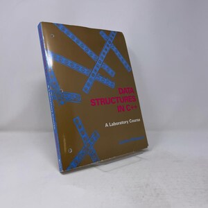 May include: A softcover textbook titled Data Structures in C++: A Laboratory Course. The cover is brown with blue geometric patterns of interconnected circles and lines. The title is printed in bold pink text, with the subtitle in white.