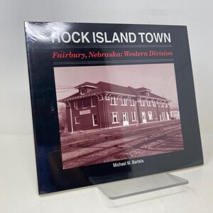 May include: A black and white photo of a brick building with the text "Rock Island Town Fairbury, Nebraska: Western Division" and "Michael M. Bartels" on the cover of a book.