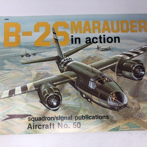 May include: A vintage book cover featuring a detailed illustration of a B-26 Marauder bomber in flight. The cover is titled "B-26 Marauder in action" and includes the text "squadron/signal publications Aircraft No. 50".