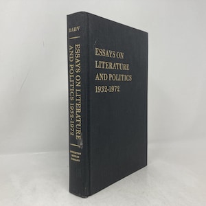 May include: A hardcover book titled "Essays on Literature and Politics 1932-1972" by Rahv. The book has a black cover with gold lettering. The book is a vintage item, likely from the mid-20th century.