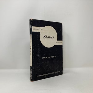 May include: A black hardback textbook titled "Engineering Mechanics Statics" by Cook and Pierce. The book is published by International Textbook Company.