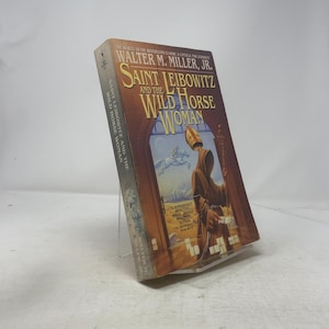 San Leibowitz y la mujer del caballo salvaje por Walter M. Miller, Jr. PB Primera edición Rústica Muy bueno 2000 336789