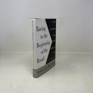 Racing To The Beginning Of The Road by Robert A. Weinberg HC First Edition Hardcover Like New 1996 321021