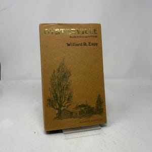 May include: A hardcover book titled "OYSTERVILLE" with the subtitle "Roads to Grandpa's Village" by Willard R. Espy. The cover is tan with gold lettering and a tree and cabin illustration.