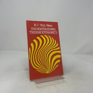 May include: A red paperback book titled Understanding Thermodynamics by H.C. Van Ness. The cover features a large, circular graphic composed of swirling yellow lines that radiate from a central point, set against a solid red background.