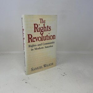May include: A hardcover book titled "The Rights Revolution" by Samuel Walker. The cover is off-white with the title in large, maroon letters. The subtitle reads "Rights and Community in Modern America."