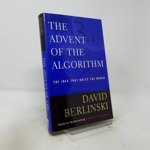 May include: A hardcover book titled The Advent of the Algorithm by David Berlinski. The cover is primarily blue with white text and a black section at the bottom featuring the author's name in gold. The subtitle reads The Idea That Rules the World.