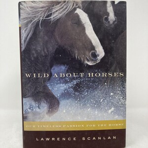 May include: A hardcover book titled "Wild About Horses" with a cover featuring a close-up of a horse's head with a white blaze. The book's subtitle reads "Our Timeless Passion for the Horse" by Lawrence Scanlan.
