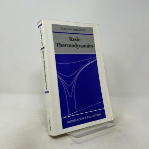 May include: A hardcover textbook titled Basic Thermodynamics by Gerald Carrington, published by Oxford Science Publications. The cover is white with a large blue rectangular graphic featuring white curved lines and a grey header bar with black text.