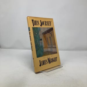 May include: A hardcover book titled "This Journey" by James Wright. The book has a yellow cover with the title in black and a watercolor image of a building. The spine reads "This Journey James Wright".