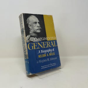 May include: A hardcover book titled The Unregimented General: A Biography of Nelson A. Miles by Virginia W. Johnson. The dust jacket features a black and white portrait of a military general, a yellow vertical stripe, and a blue lower section.