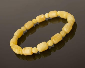 Joya de colección de ámbar báltico real: cuentas de ámbar blanco-amarillo natural, pulidas a mano.