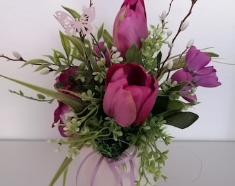 Spring arrangement, floral arrangement, purple tulips, pansies and crocuses