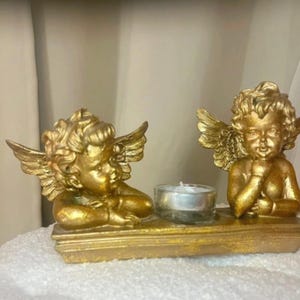 Angel candle holder