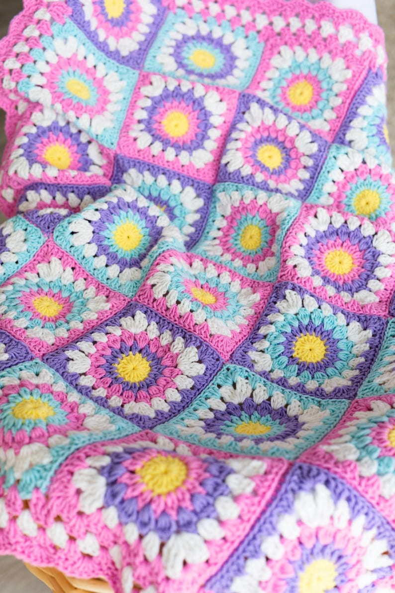 Handmade crochet baby blanket with colorful squares – easy crochet pattern