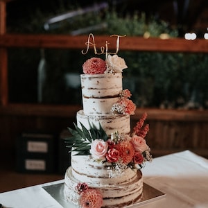 Customizable initial topper