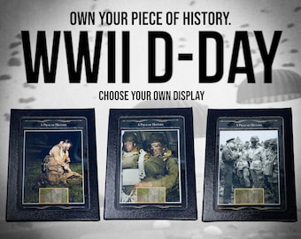 May include: Three black framed displays with a white background and the text "A Piece of History" and "WWII D-Day Normandy Paratroopers 1944" in gold lettering. Each display features a black and white photograph of a paratrooper during World War II.
