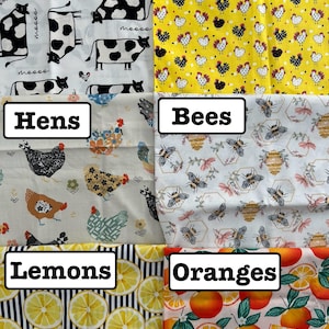 K&ouml;nnte beinhalten: Eine Collage aus sechs Stoffmustern mit verschiedenen Motiven: schwarz-wei&szlig;e K&uuml;he, gelbe H&uuml;hner, bunte Hennen, Bienen mit Waben, gelbe Zitronenscheiben auf dunkelblauen Streifen sowie Orangen mit gr&uuml;nen Bl&auml;ttern auf hellem Hintergrund.