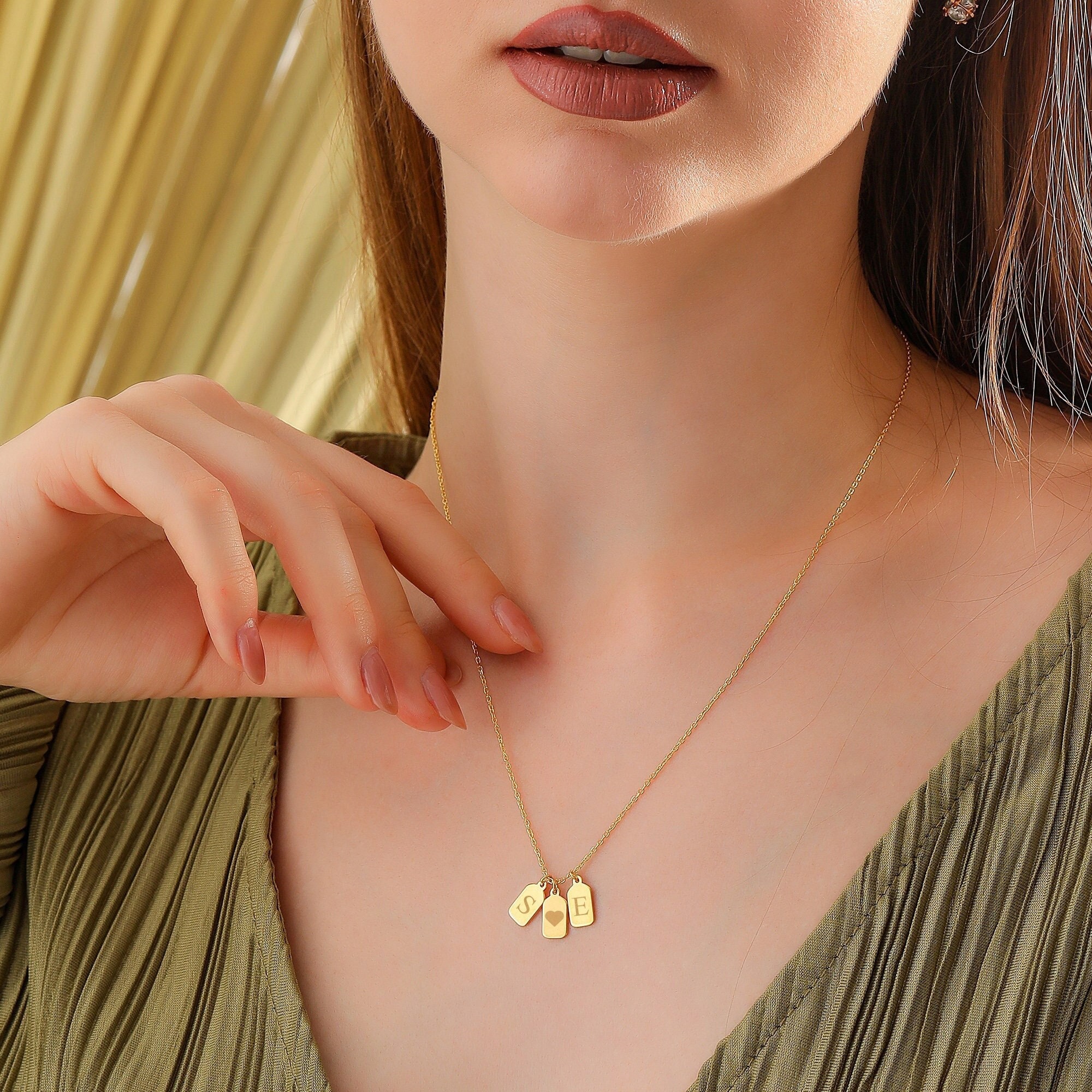 janjiTOKYO MINI TAG necklace top