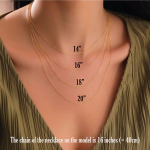 image of a model wearing different size of 14k solid gold chains to show how they would look on human body