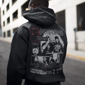 May include: Dark gray hoodie with a graphic design on the back. The design includes the text "SUICIDEBOYS" in a stylized font, along with several images and the text "I NO LONGER FEAR THE RAZOR".
