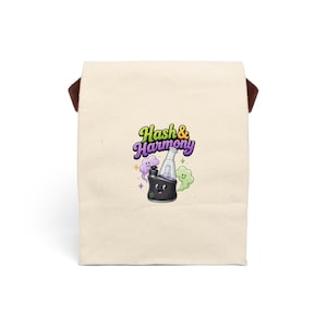 May include: A cream-coloured lunch bag with brown handles. The bag displays a cartoon graphic of a black and clear smoking device with a smiling face, purple and green smoke clouds, and the text "Hash & Harmony" in a colourful font.