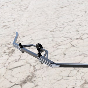 May include: A silver metal trailer hitch with a black safety chain attached. The hitch is designed to connect a trailer to a vehicle.