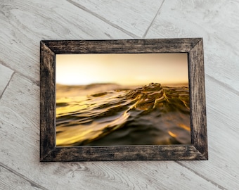 Dark Wooden frame on a white wooden background