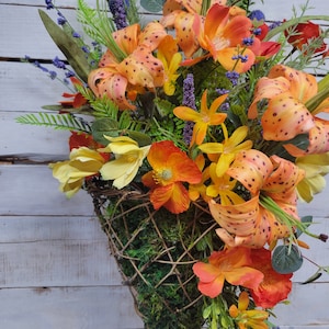 Hanging basket with spring flowers, cone shaped basket with flowers,  basket with lillies, orange Lillie floral basket