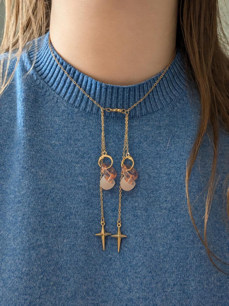 Collar con soporte para tapones para los oídos, joyería de acero inoxidable dorado, collar para guardar tapones para los oídos, estrella de cuatro puntas, regalo celestial para mujer imagen 1