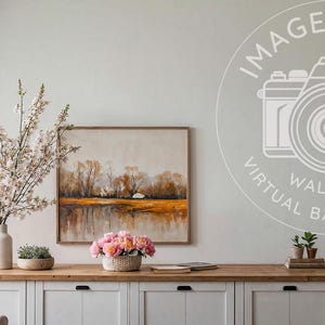 May include: A white cabinet with three drawers and three doors. The cabinet is decorated with a vase of white flowers, a painting of a landscape, and a bowl of pink flowers. The cabinet is in a room with a window and a white wall.