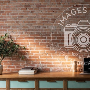 May include: A home office setup with a red brick wall background. A wooden desk with teal drawers holds a laptop, books, a mug, and a vase with greenery. The image includes the text "IMAGES BY RP VIRTUAL WALL ART BACKGROUNDS."