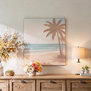 May include: A wooden cabinet with drawers holds a framed beach scene painting, a lamp, and floral arrangements. The painting depicts palm trees on a sandy beach with a blue ocean. A white vase holds yellow and pink flowers.