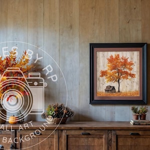 May include: A wooden cabinet with a framed picture of an autumn scene. A vase of autumn leaves and a table lamp with a beige lampshade are on the cabinet. The image has a warm, autumnal feel.