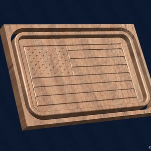 May include: A wooden cutting board with a raised design of the American flag. The board is surrounded by a raised frame.