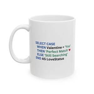 May include: White ceramic coffee mug with a blue and green text design that reads "SELECT CASE WHEN Valentine = 'You' THEN 'Perfect Match'❤ ELSE 'Still Searching' END AS LoveStatus".