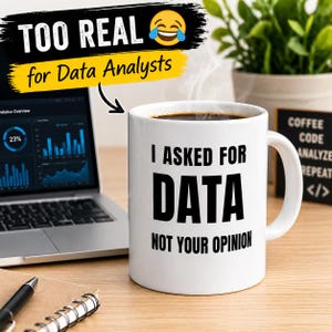 May include: A white ceramic mug with the text "I ASKED FOR DATA NOT YOUR OPINION" in black. The mug is filled with coffee, and steam rises from the top. The image also includes a laptop displaying data analytics and the text "TOO REAL for Data Analysts."