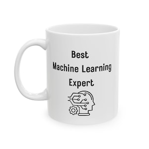 May include: White ceramic mug with black text that reads "Best Machine Learning Expert" and a black and white illustration of a head with a circuit board inside.
