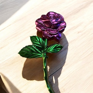 Broche de rosa