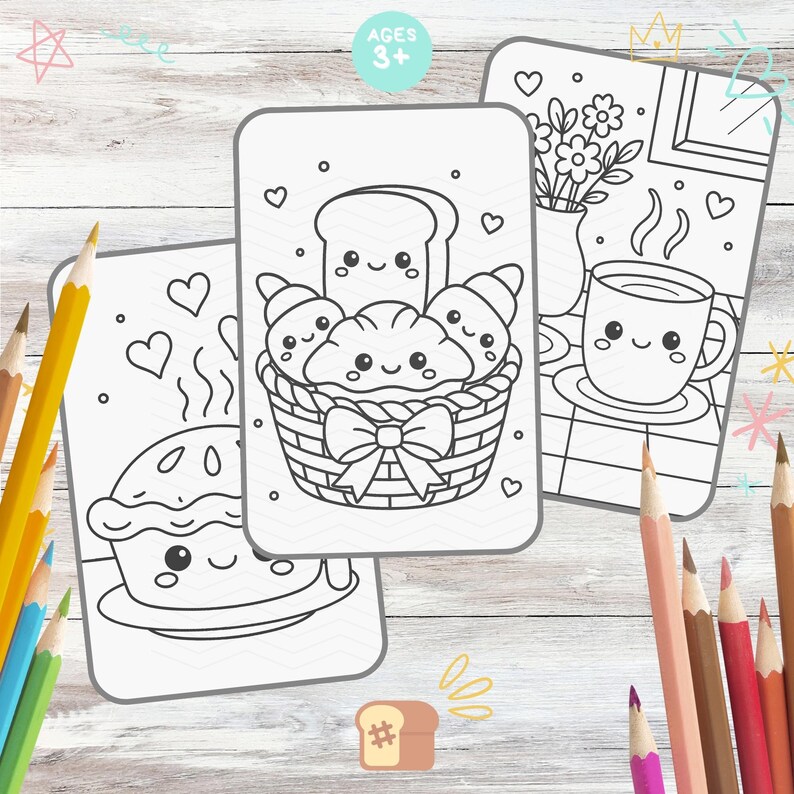May include: Three coloring pages with food-themed illustrations and the text "AGES 3+". One page features a pie, another a basket of croissants and bread, and the last a cup of coffee and flowers. Colored pencils are scattered around the pages.
